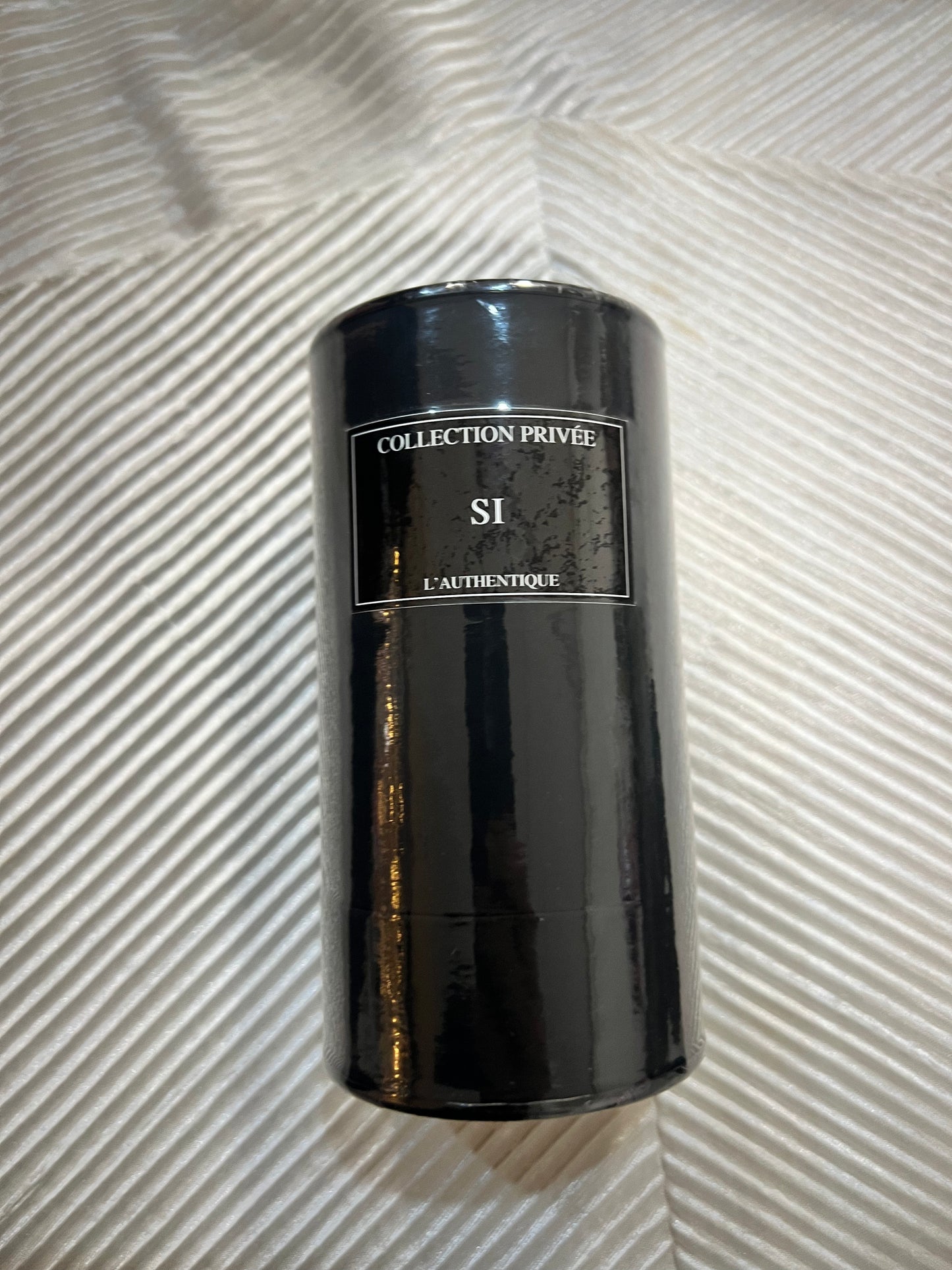 Si